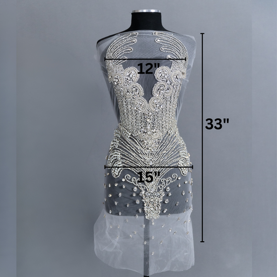 A bodice covered in many silver rhinestones, with labeled measurements.