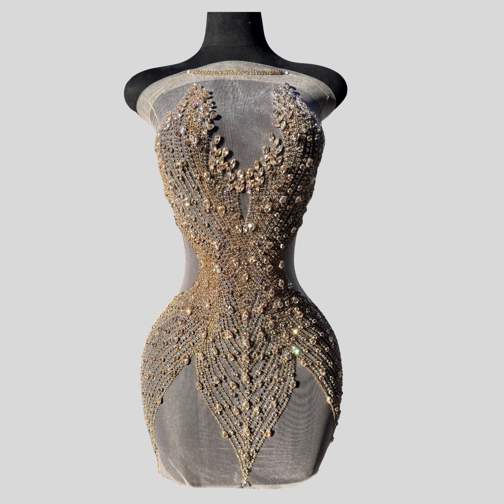 Hand-made rhinestone bodice appliqué with cascading glass rhinestones on sheer mesh, available in silver, gold, and black