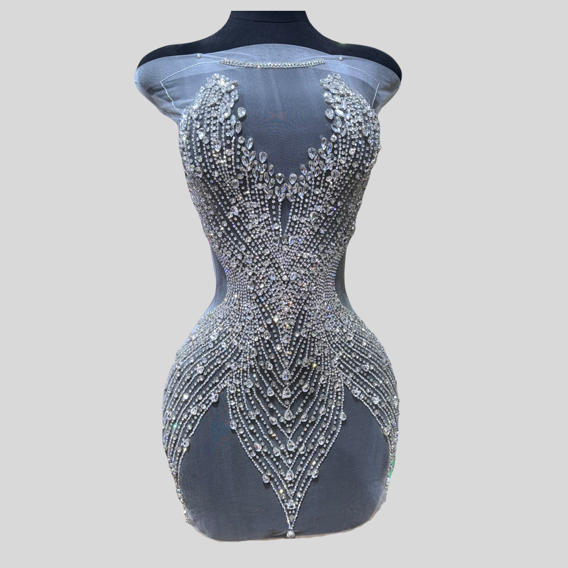 Hand-made rhinestone bodice appliqué with cascading glass rhinestones on sheer mesh, available in silver, gold, and black