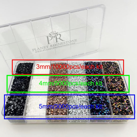 A plastic box containing separate compartments of different colored rhinestones.