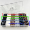 A plastic box containing separate compartments of different colored rhinestones.